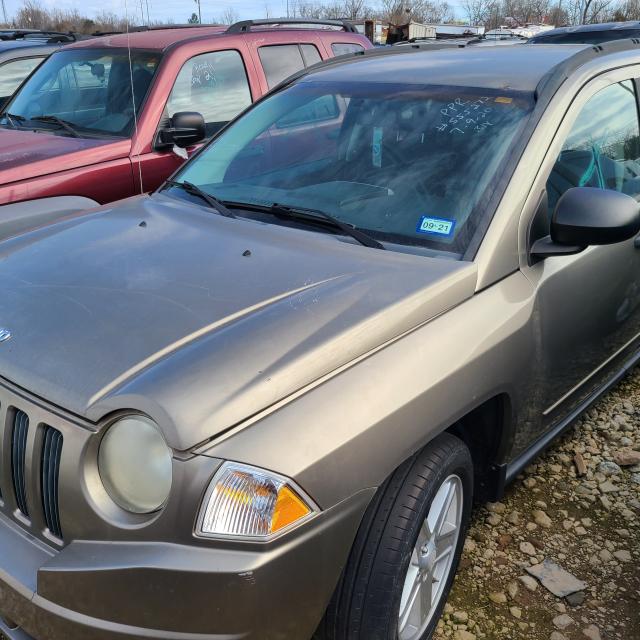 Gold Jeep compass