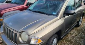 Gold Jeep compass